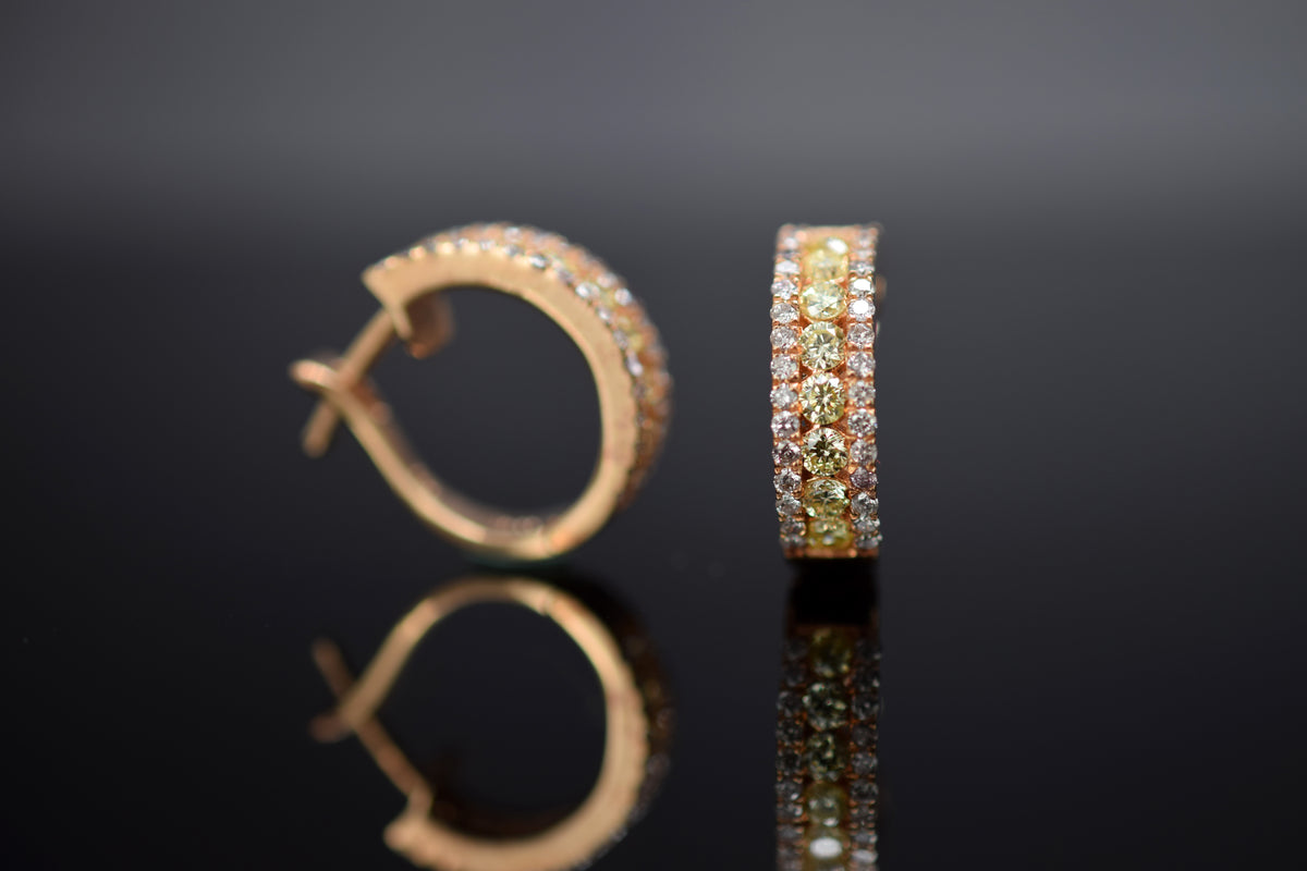 Diamantcreolen mit Diamantbesatz aus 14 kt. Rotgold