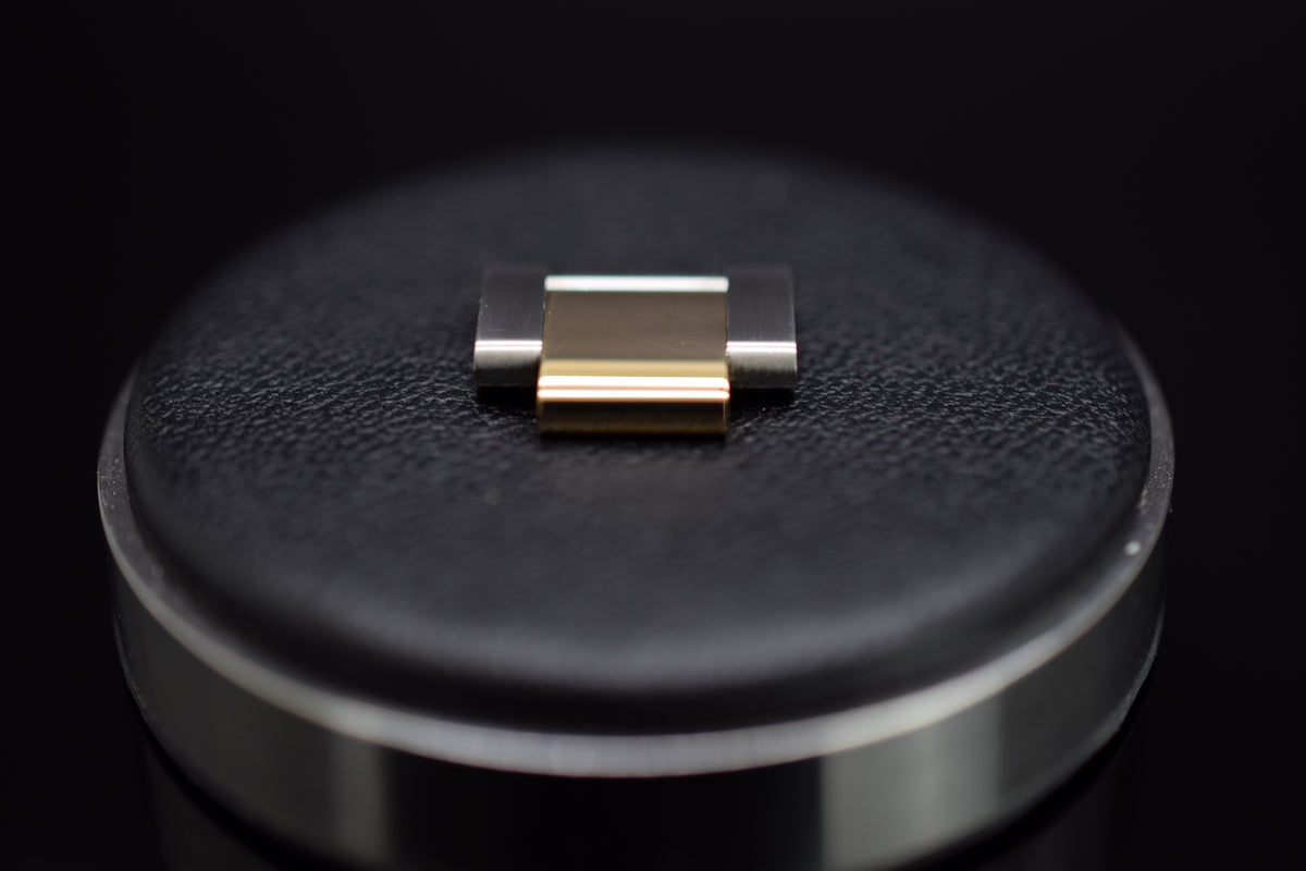 Rolex Armband-Element aus Edelstahl/Gelbgold