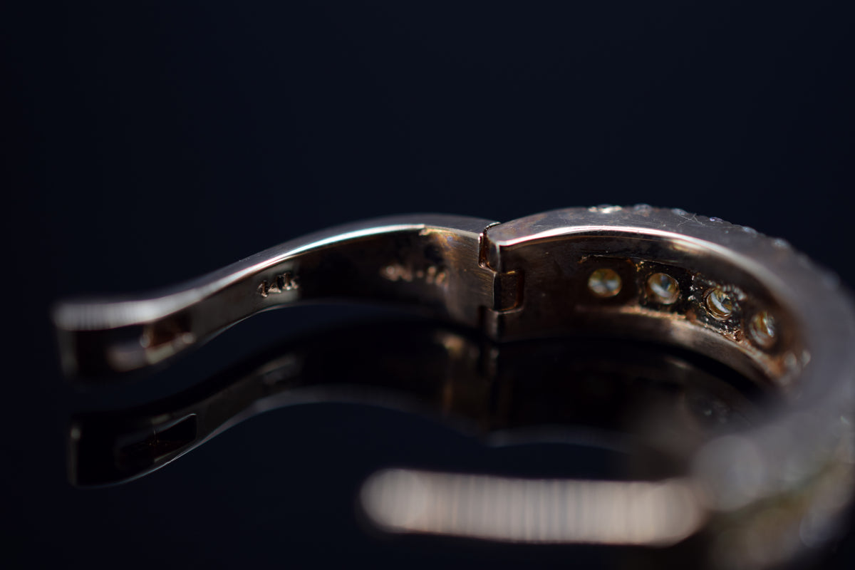 Diamantcreolen mit Diamantbesatz aus 14 kt. Rotgold