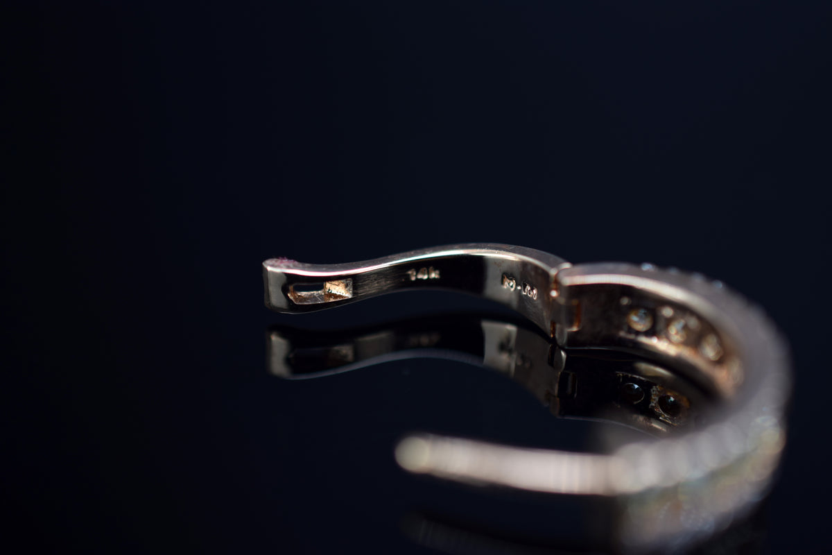 Diamantcreolen mit Diamantbesatz aus 14 kt. Rotgold