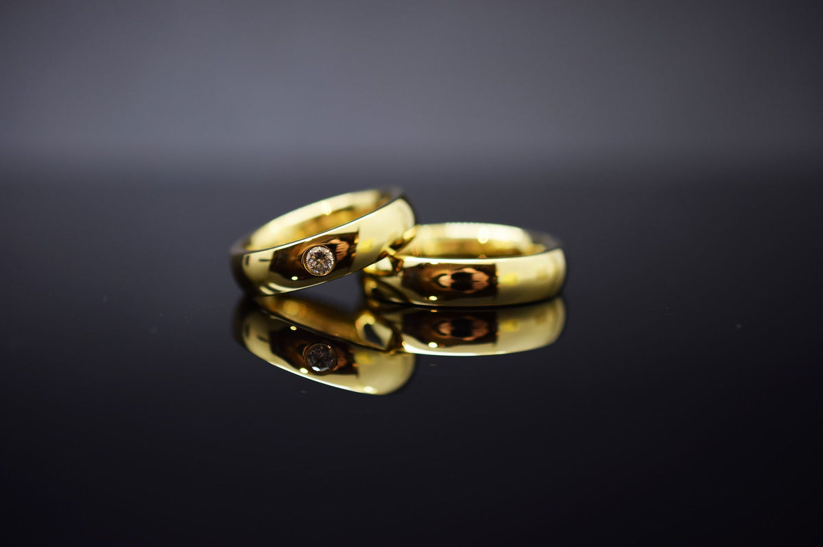 Trauringe - 585er Gelbgold - 0.14 ct. Diamant - Modell M015