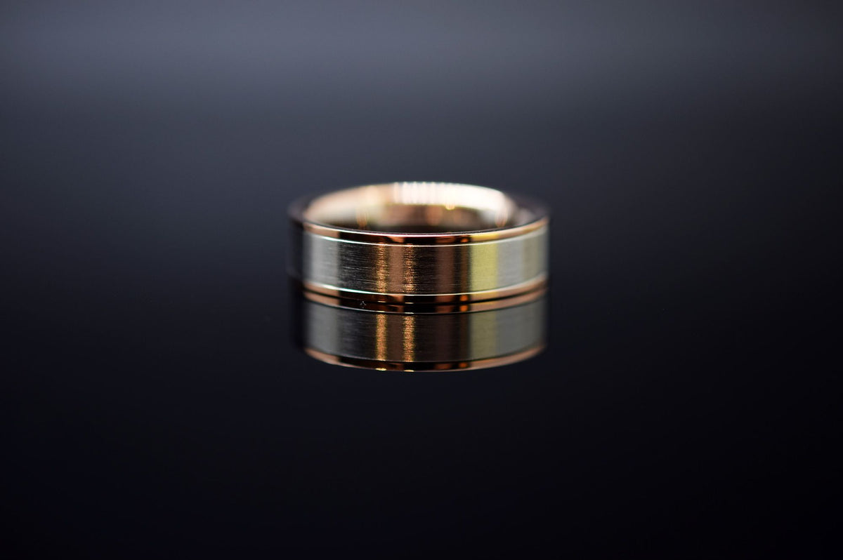 Trauringe - 585er Rotgold und 500er Palladium - 0.035 ct. Diamant - Modell M013