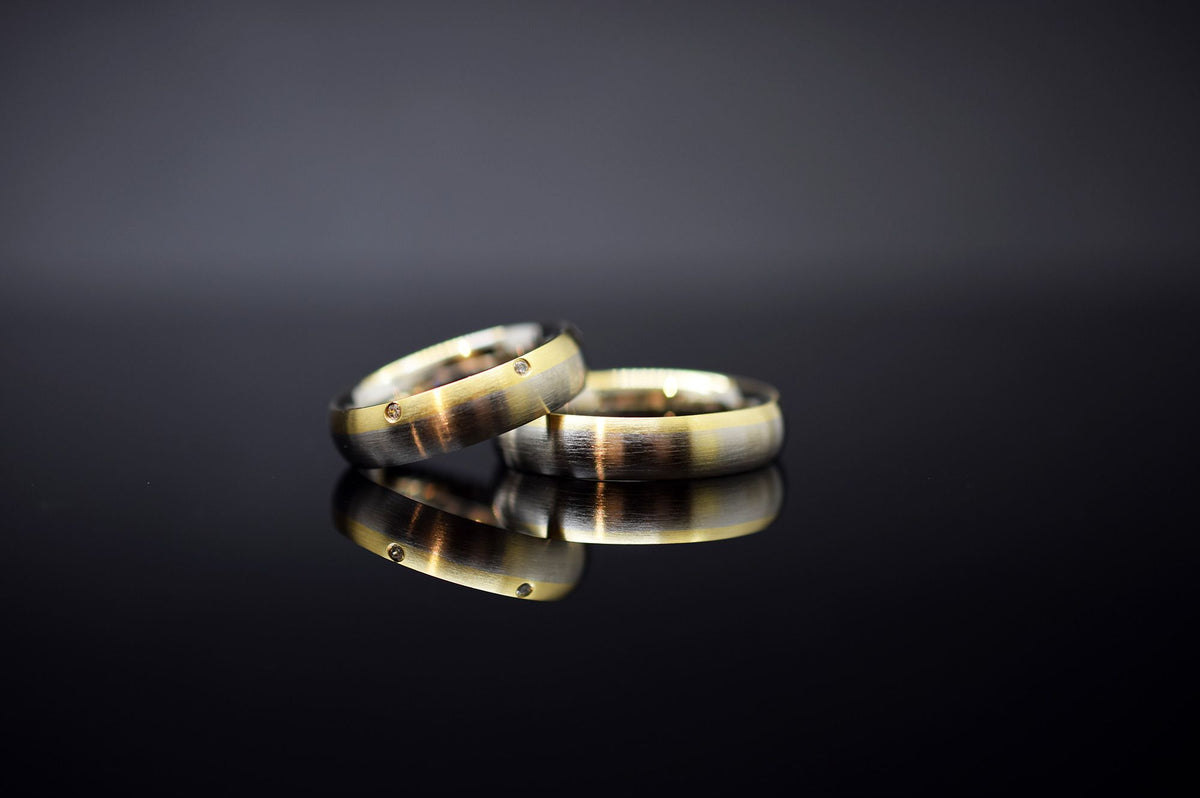 Trauringe - 585er Weiß- und Gelbgold - 0.06 ct. Diamant - Modell M009