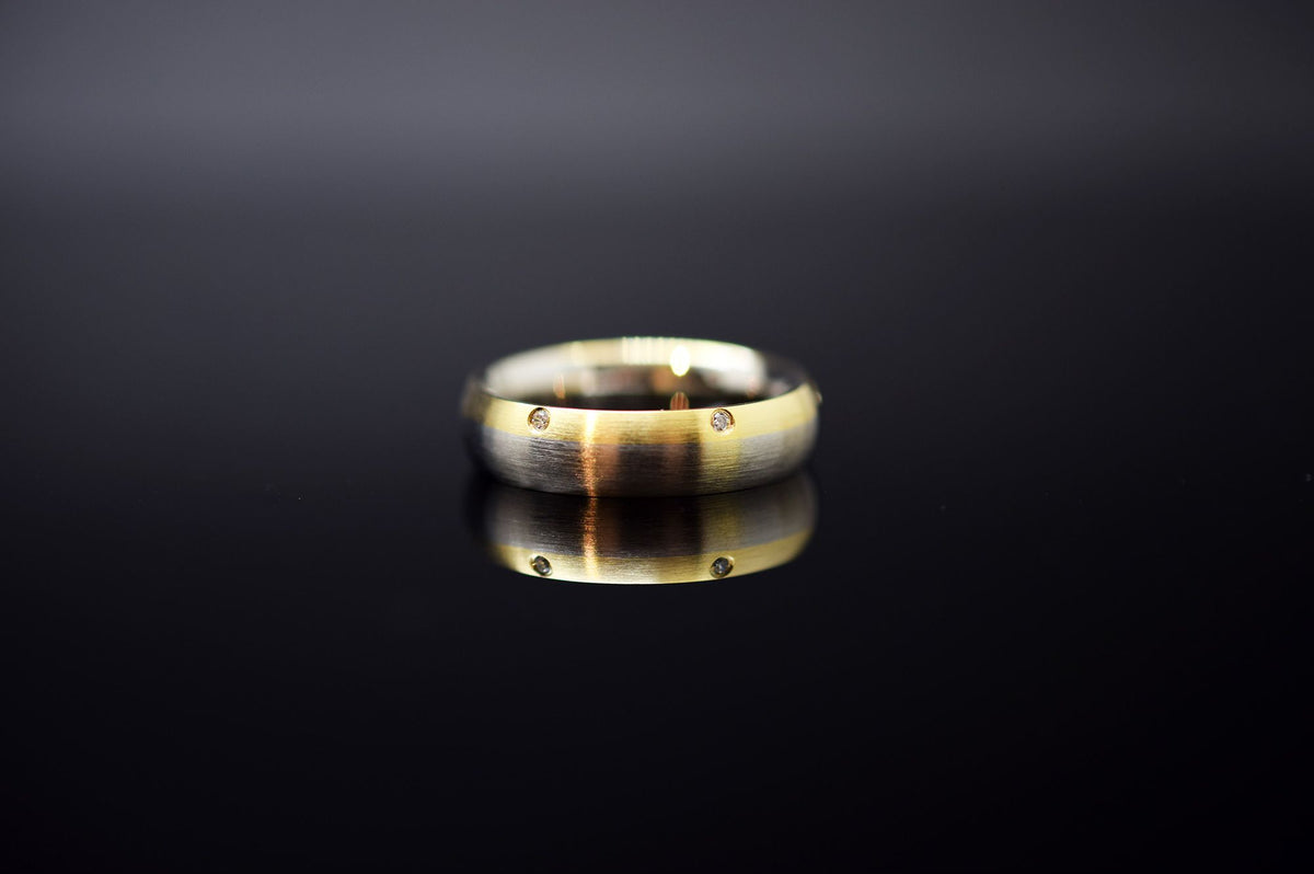 Trauringe - 585er Weiß- und Gelbgold - 0.06 ct. Diamant - Modell M009