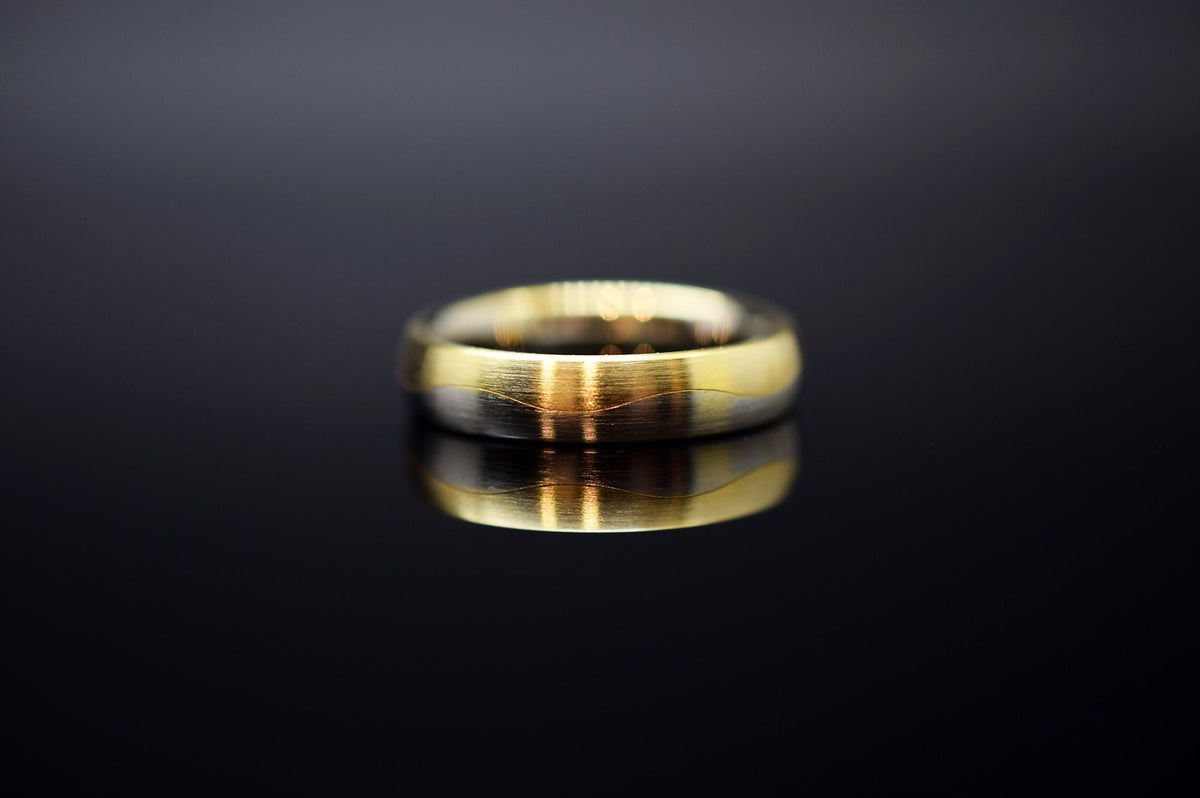 Trauringe - 585er Weiß- und Gelbgold - 0.06 ct. Diamant - Modell M012