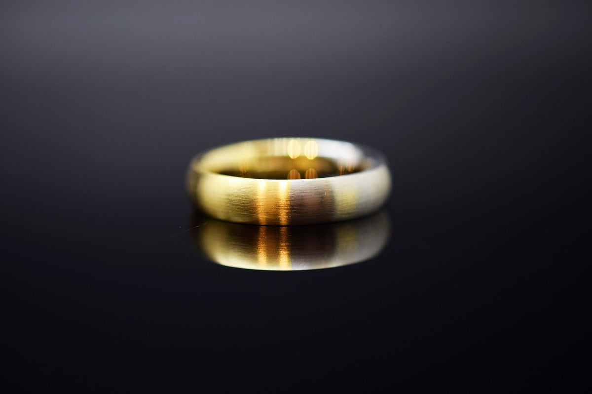 Trauringe - 585er Weiß- und Gelbgold - 0.12 ct. Diamant - Modell M011